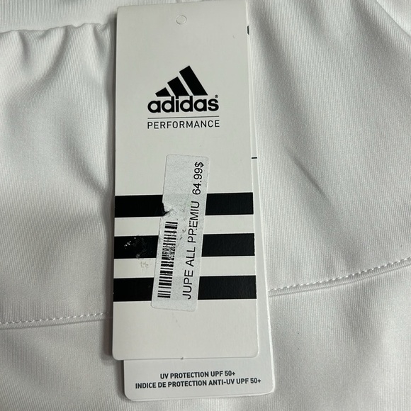 ADIDAS white skort with pleats on the bottom  half . Then two horizontal bands. - Picture 6 of 11